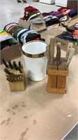 2 knife sets with wooden black and an ice bucket