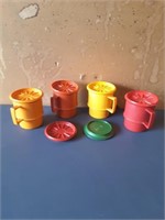 Tupperware 4 mugs 4 matching lids 2 extra lids