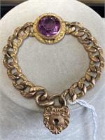 Yellow vintage link bracelet w/ purple stone.