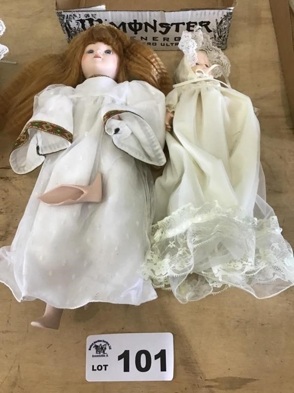 2 PORCELAIN DOLLS, BROKEN LEG