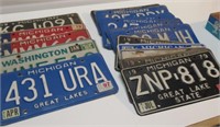 LOT OF (17) ASSORTED METAL LICENSE PLATES.