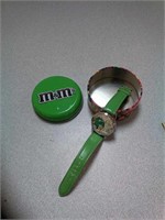 < Green M&M candy wristwatch watch in tin