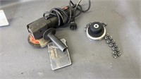 A grinder and cutting attachment for a trimmer