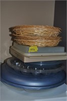 misc plastic ware and wicker plate holders