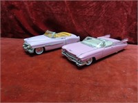 (2)Diecast pink Cadillacs. One is tin friction.