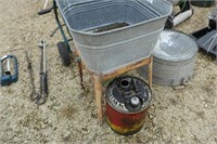 Washtub with stand and Cenex Co-op gas can - 5 gal