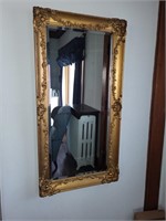 23" x 45” gold framed mirror