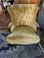 Gold wingback chair