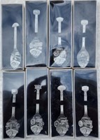Eight John Deere Collector Spoons