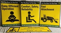 Four John Deere "Put the Best to the Test" Signs