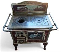 Nanquette Brand Antique Woodburning Stove.