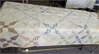 Quilt, hand sewn, well worn