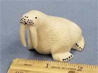 3" fossilized ivory carving of a walrus by Singyke