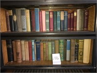 3 shelves of antique books
