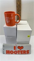 50 NEW HOOTERS 9X3 STICKERS AND 6 HOOTERS MUGS
