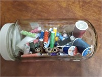 Canister of thread, bobbins
