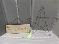 Welcome sign and star made with barbed wire