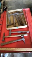 Various vintage hand hammers.