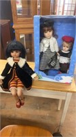 2 PORCELAIN DOLLS IN BOX AND CHAIR SITTER DOLL