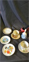 Plates , bells and tea cups