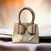 grey ostrich print purse with accent bow