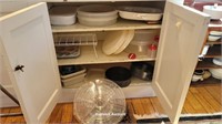 Contents bottom right cupboard - Tupperware, lazy