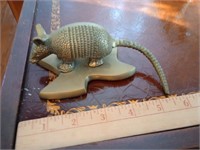 Brass armadillo on a Texas State Base