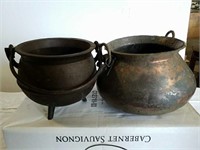 Small cast iron kettle and metal pot