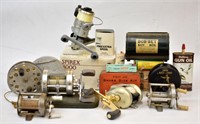 ASSORTED FISHING REELS, TACKLE AND MORE