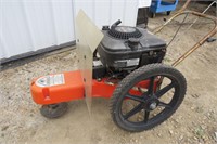 5 H.P. WHEELED TRIMMER / OWNER SAYS WORKING