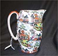 Coloured willow pattern jug