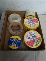 Group of wet paint barricade tape with packing