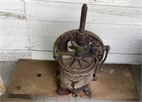 Antique Enterprise lard press attached to a 35