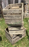 A lot of three apple crates includes a National