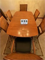 Dining table with 6 chairs, 2 leaf's, and pads,