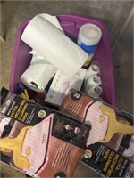Tote of cleaning supplies