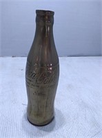 Brass coke bottle