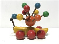 Vintage Kouvalias banana slug wood pull toy