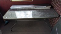 glass top table 35" x 66" (no contents)