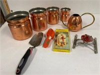 Copper pots and garden tools