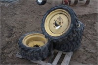 (4) LSW 305-546 Skid Steer Tires on 8 Bolt Rims