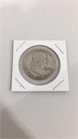 1957 Ben Franklin silver half dollar.  Fine/very