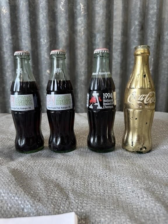 4 vintage promotional Coke bottles