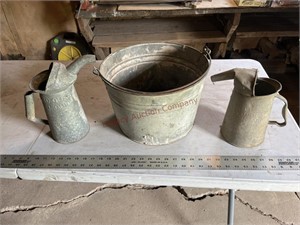 Galvanized oil cans and as is bucket