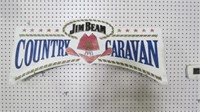 JIM BEAM COUNTRY CARAVAN TIN SIGN, 35.5 X 16"