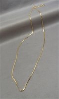 14K Yellow gold necklace. Measures 22" long.