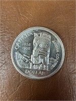 1958 Canada Totem Pole Silver Dollar