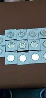 Grouping of 14 1964 silver Kennedy half dollars