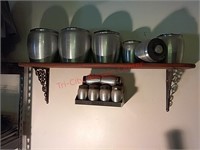 Stainless steel canisters, spice rack, wood shelf