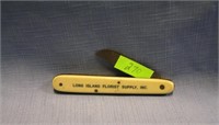 Antique celluloid advertising pocket knife